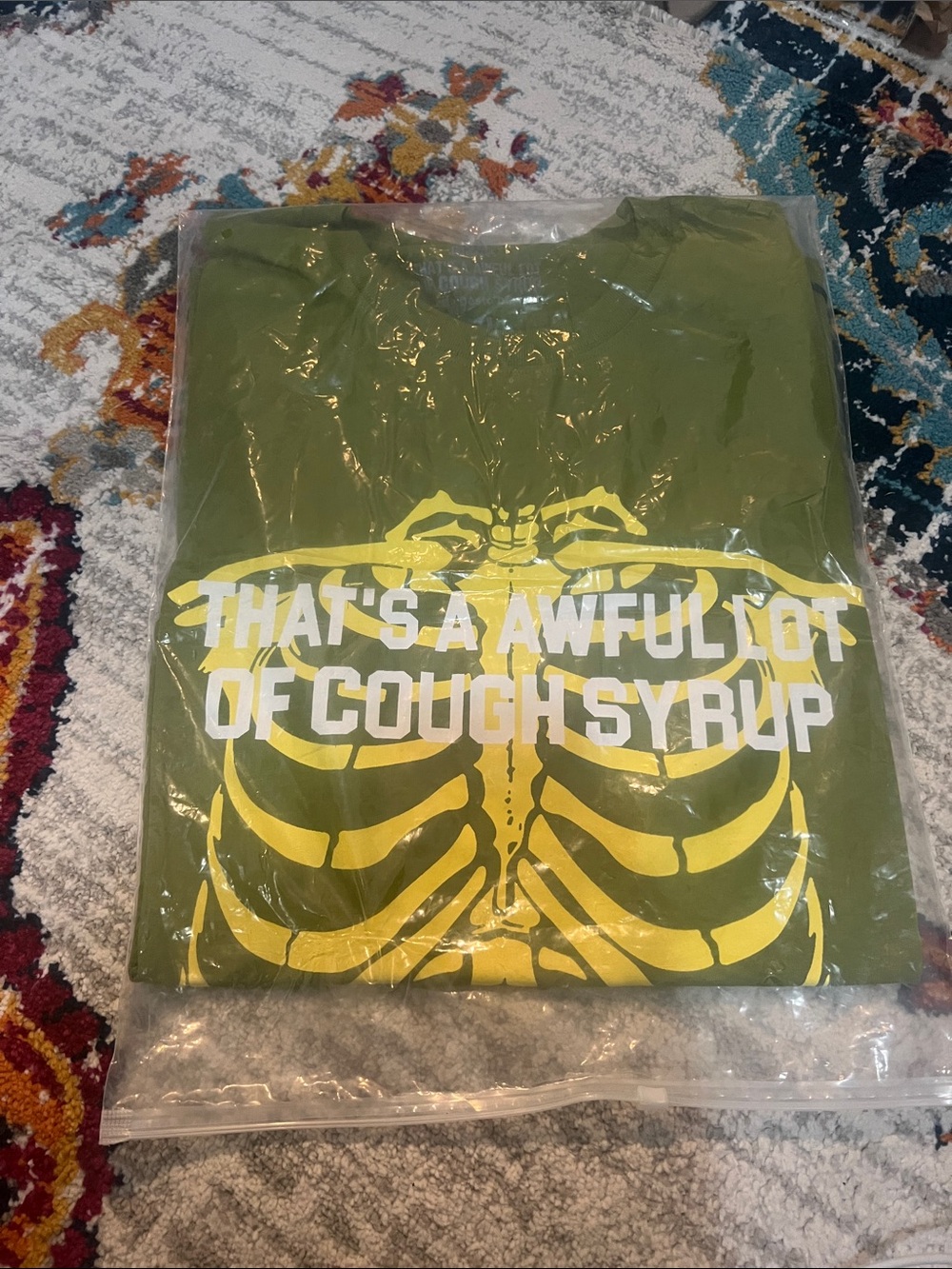 Men's Olive Green Short-Sleeve Graphic Tee with Yellow Skeleton Print